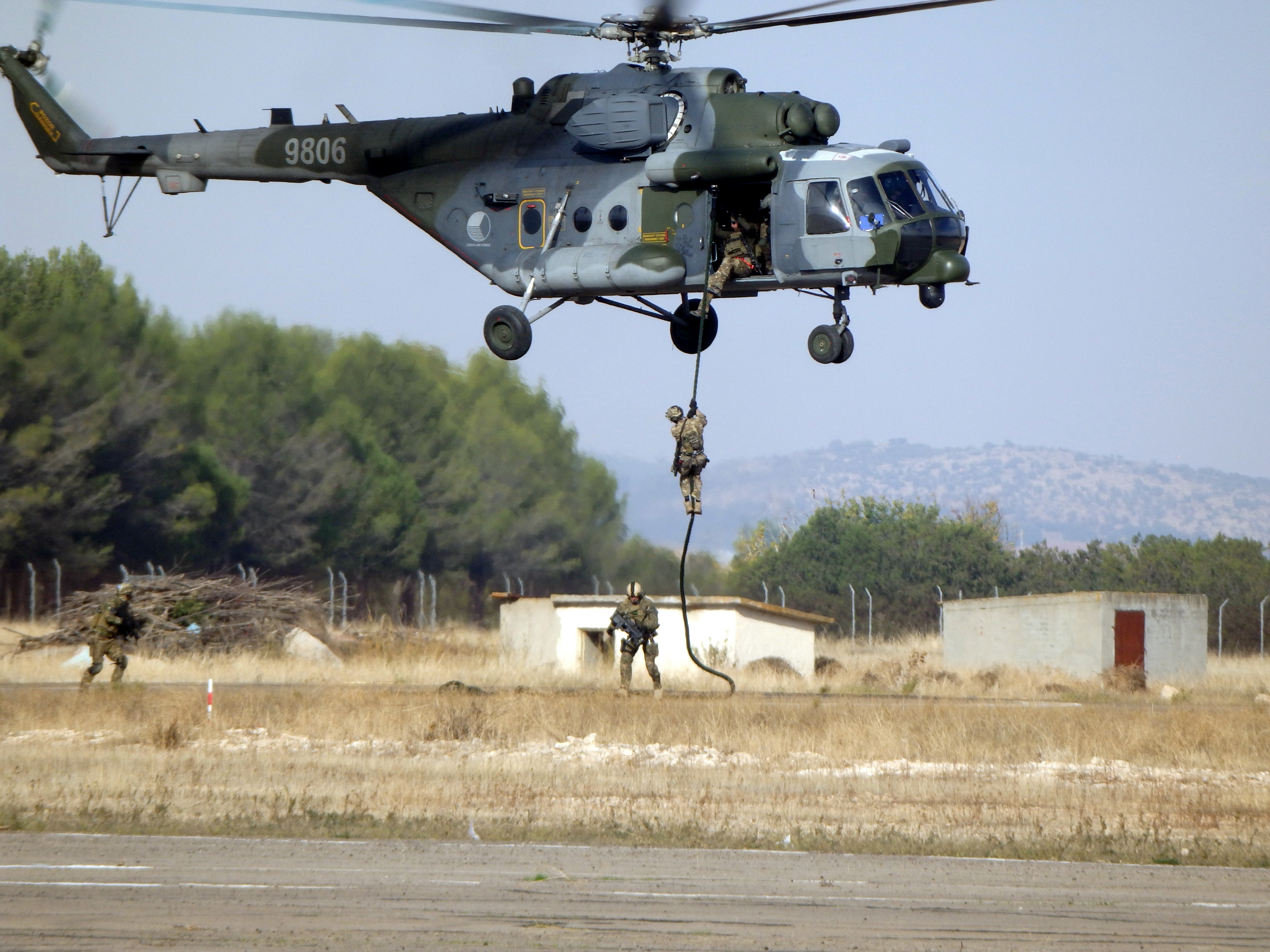 NATO forces conduct fast rope insertion